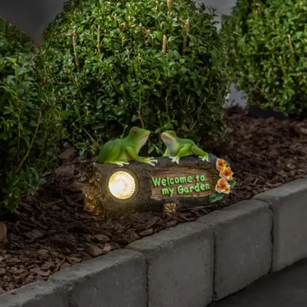 Lampă LED de exterior „Frogy“ cu panou solar (24 × 14 cm)